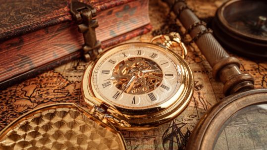 Vintage pocket watch. Vintage background Concept of time history.